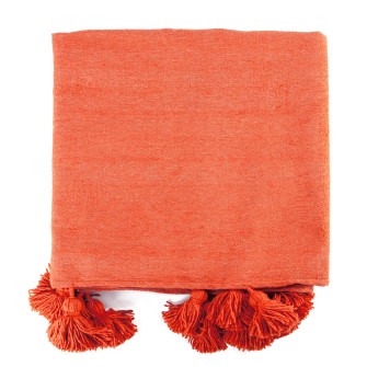 Obrazek dla: Ceglasty pled bawełniany. Ręcznie tkana, kwadratowa narzuta w kolorze pomarańczowym z chwostami. Ciepły akcent do wnętrz w stylu boho.