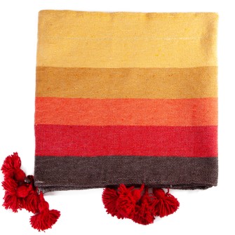 Obrazek dla: Wielokolorowy pled bawełniany w pasy. Ręcznie tkana narzuta z czerwonymi chwostami. Energetyczny dodatek w stylu boho i etno.